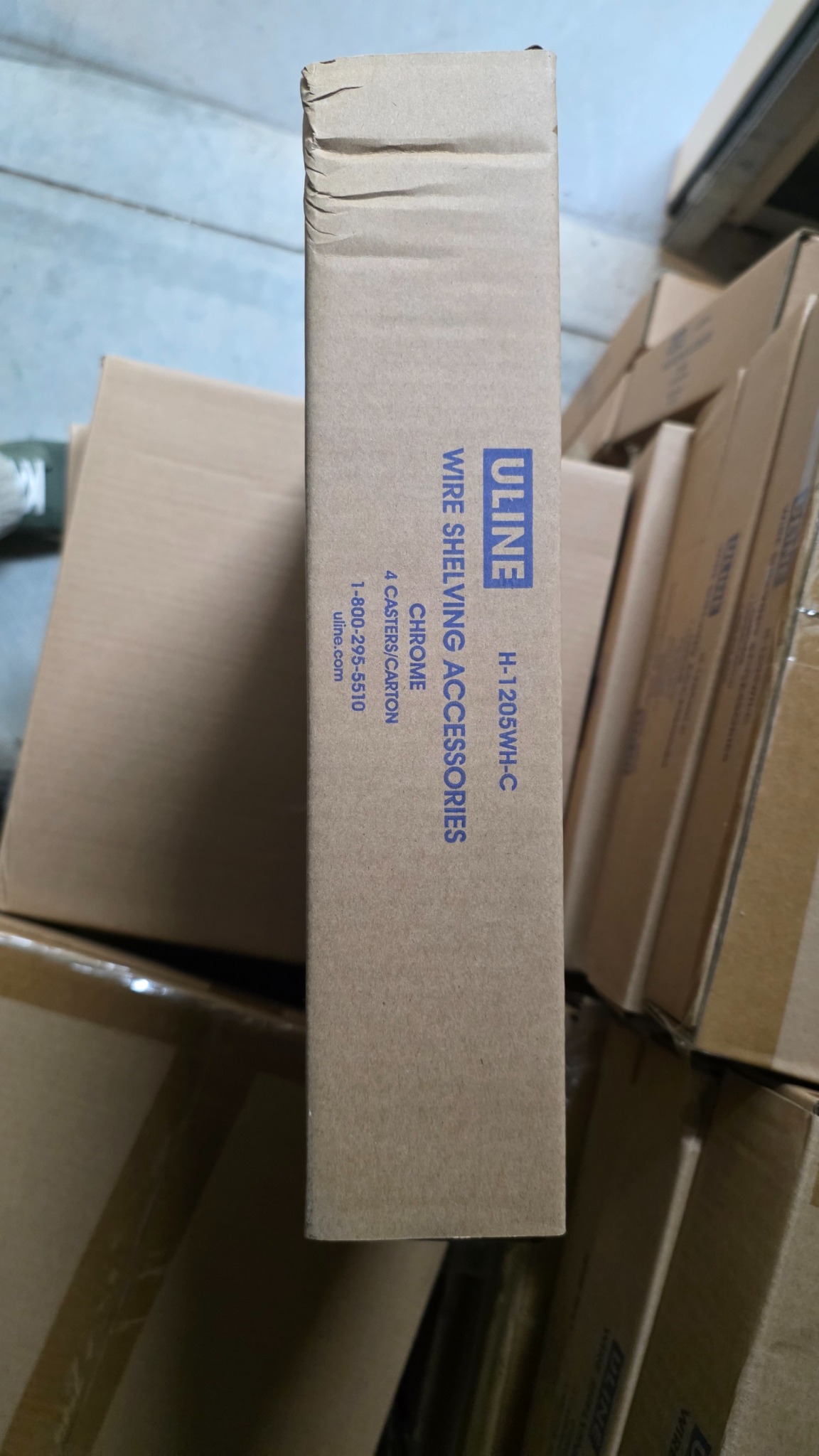 Uline carton label showing H-1205WH-C and four casters per carton